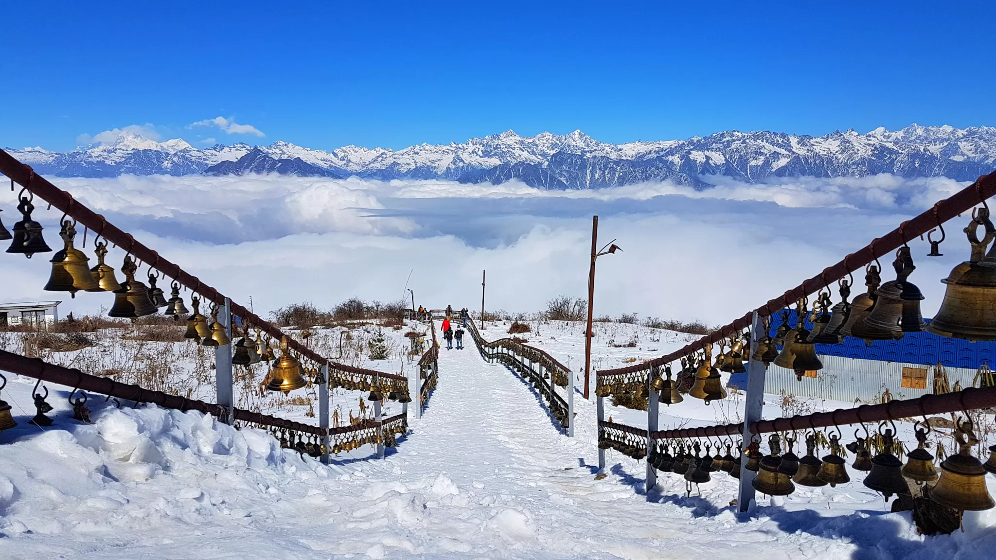 Pathibhara Devi temple in winter season with snowfall and beautiful mountain range view in the back